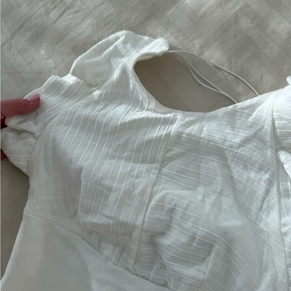 A fitted dress below the knees. White. Size S-M. Zara. - Picture 7 of 10